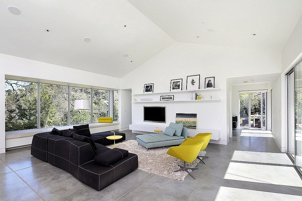 Modern living room of HIllside home with pops of yellow