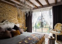 Neo-Baroque-bedroom-with-brick-wall-and-chandelier-217x155