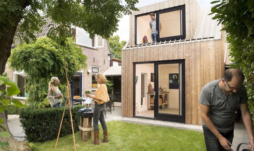 Wooden Volume Turns Old Shed into a Lovely Backyard Painting Studio