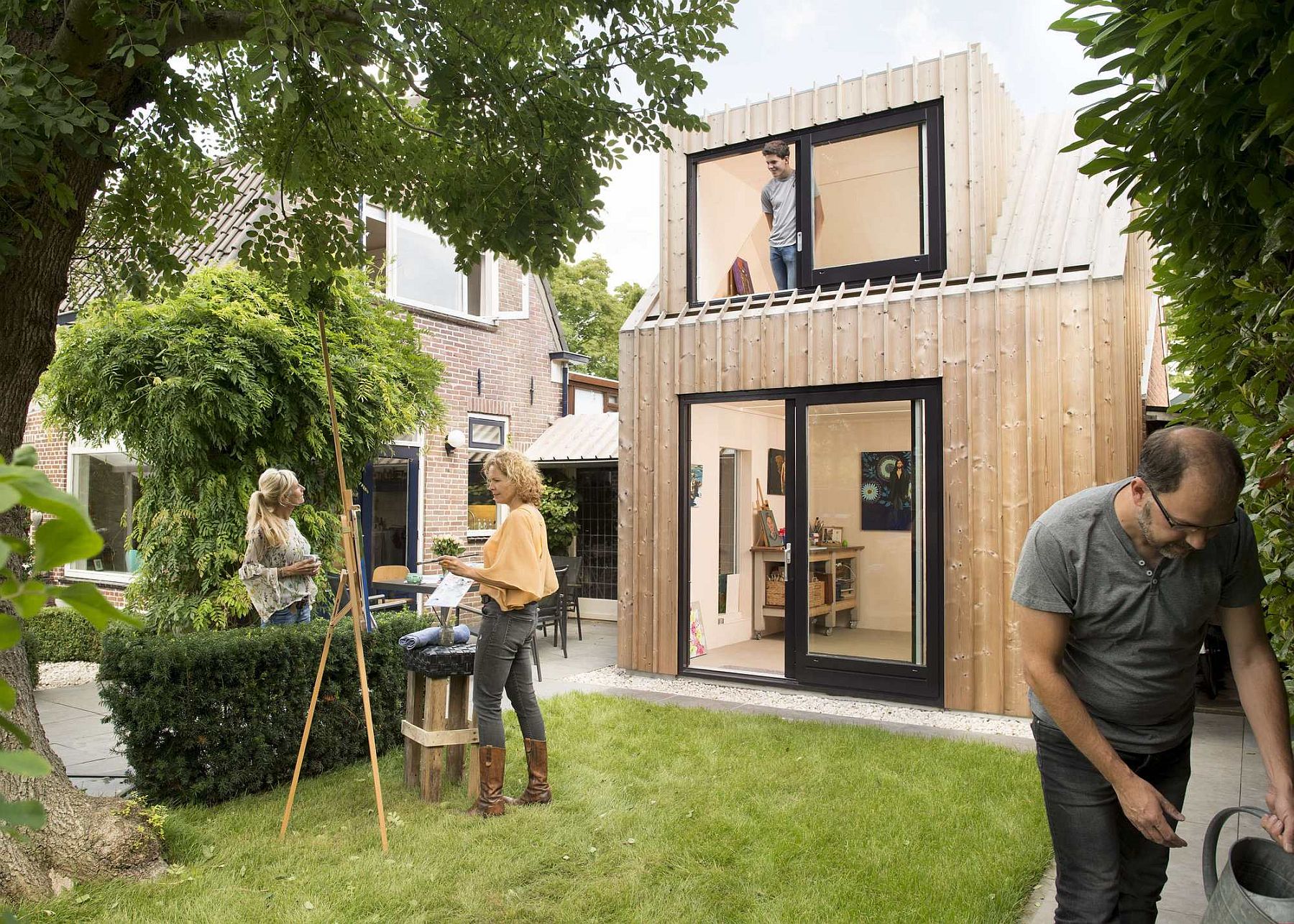 Old shed turned into a backyard painting studio in the Netherlands