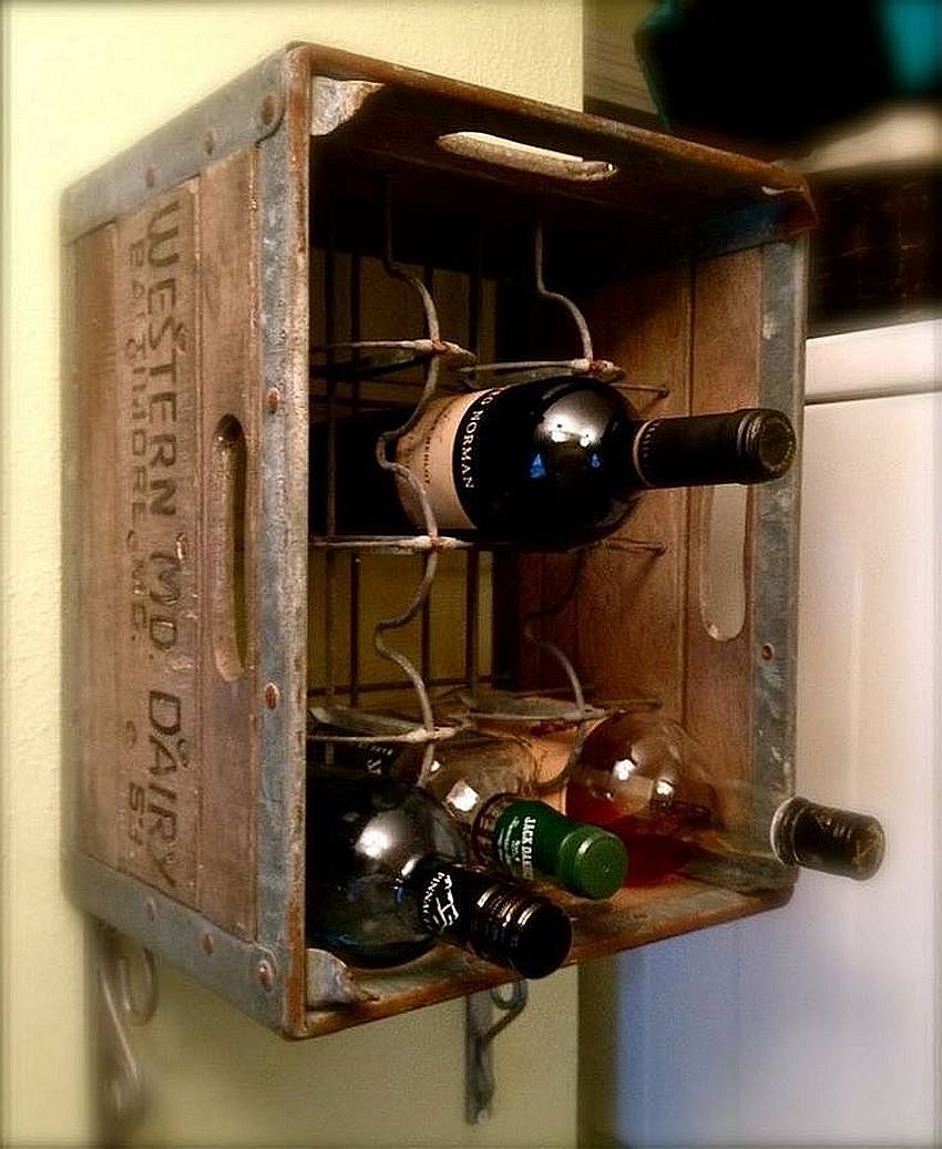 Old wooden crate upcycled into a gorgeous wine rack