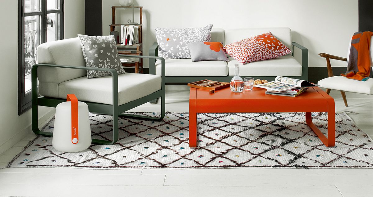 Pops of color and the clover pattern of the cushions brings brightness to the sunroom