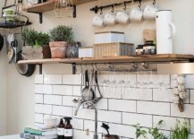 Scandinavian and rustic styles meet inside this small kitchen 217x155 Rugged Charm: 20 Rustic Shelving Ideas for your Modern Kitchen