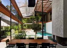 Screened-and-shaded-interior-of-the-open-holiday-home-217x155