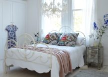 Shabby-chic-bedroom-with-a-chandelier-that-blends-into-the-backdrop-217x155