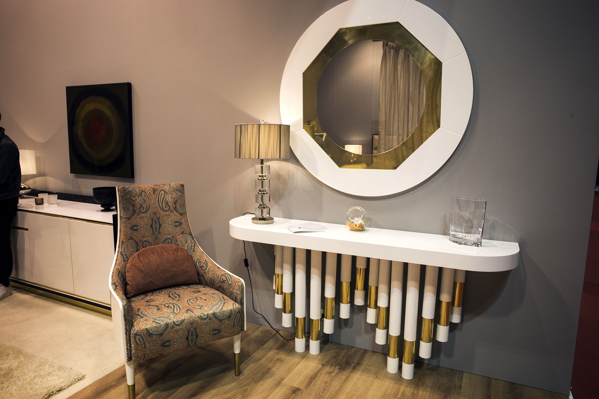 Slim and stylish bedroom vanity with a matching mirror that brings Hollywood Regency style