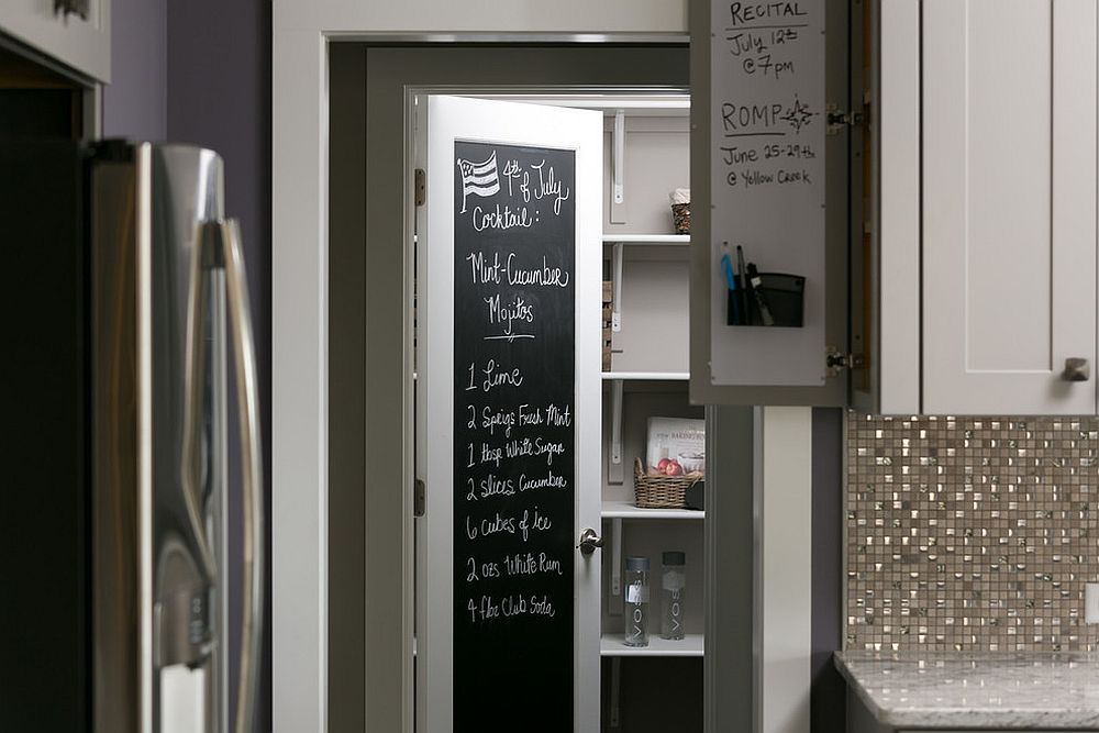 Small craftsman style kitchen with pantry that features a chalkboard door