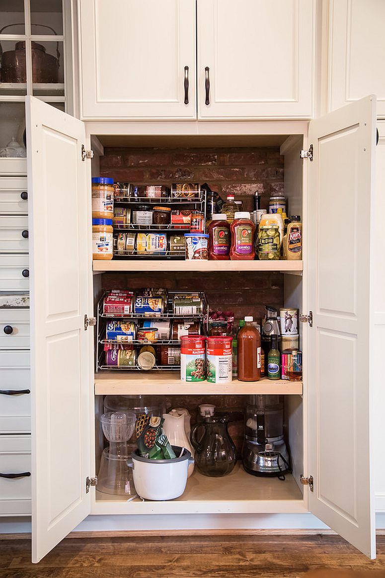 Small-traditional-kitchen-cabinet-pantry-with-brick-wall-backdrop