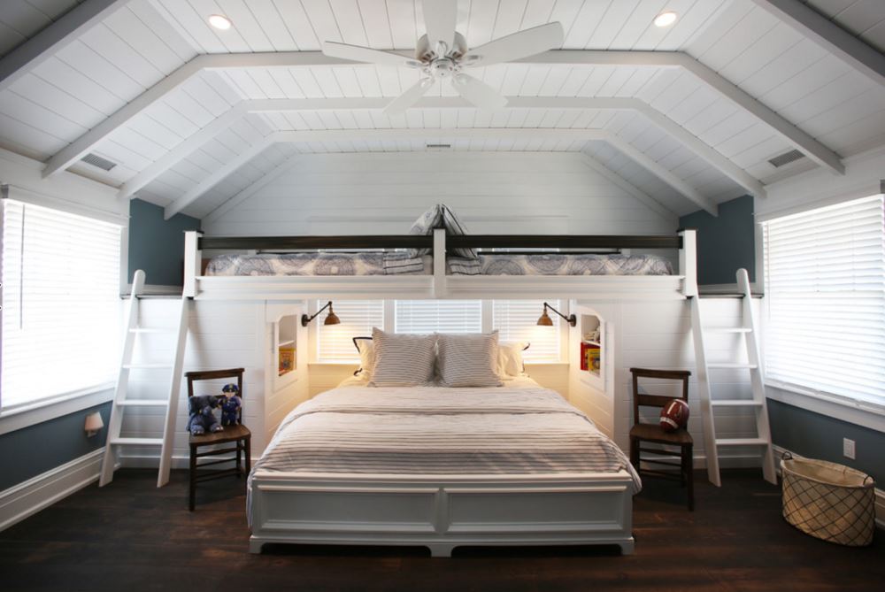 Space-savvy bedroom with loft sleeping nook in the attic