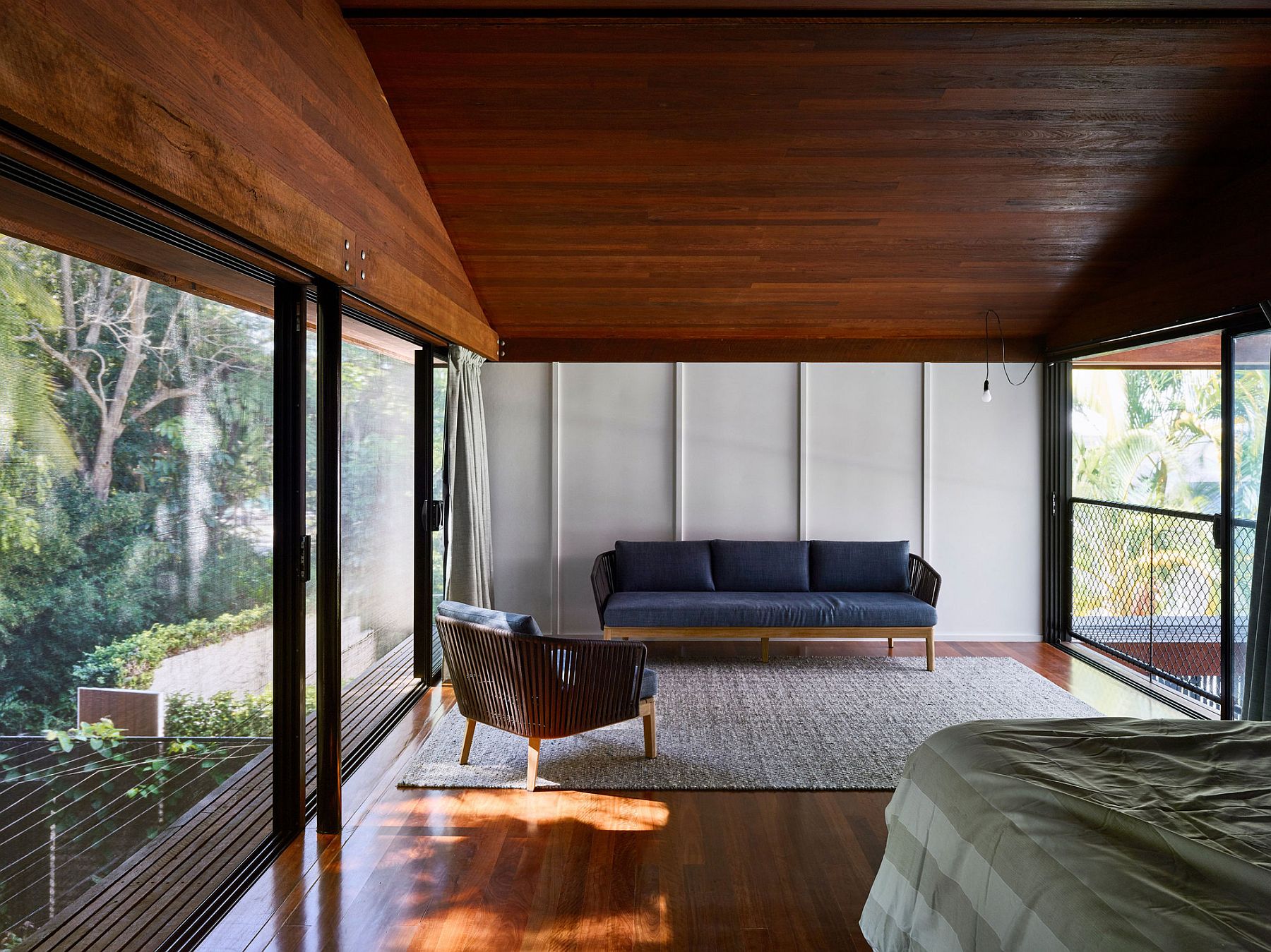 Upper level bedrooms with a view of the rainforest