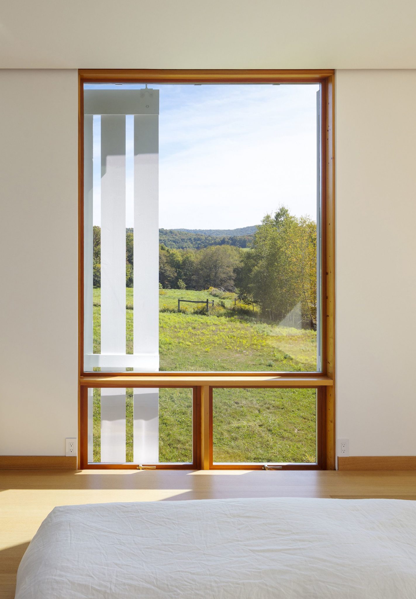 View of the green landscape from the bedroom window