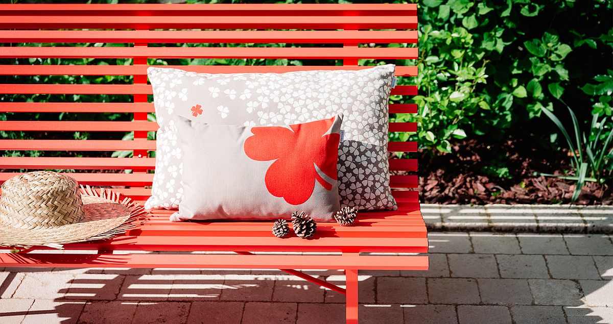 Vivacious Trefle cushions coupled with the Louisiane bench