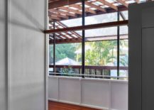 Wooden-and-concrete-verandah-style-holiday-home-near-a-rainforest-217x155