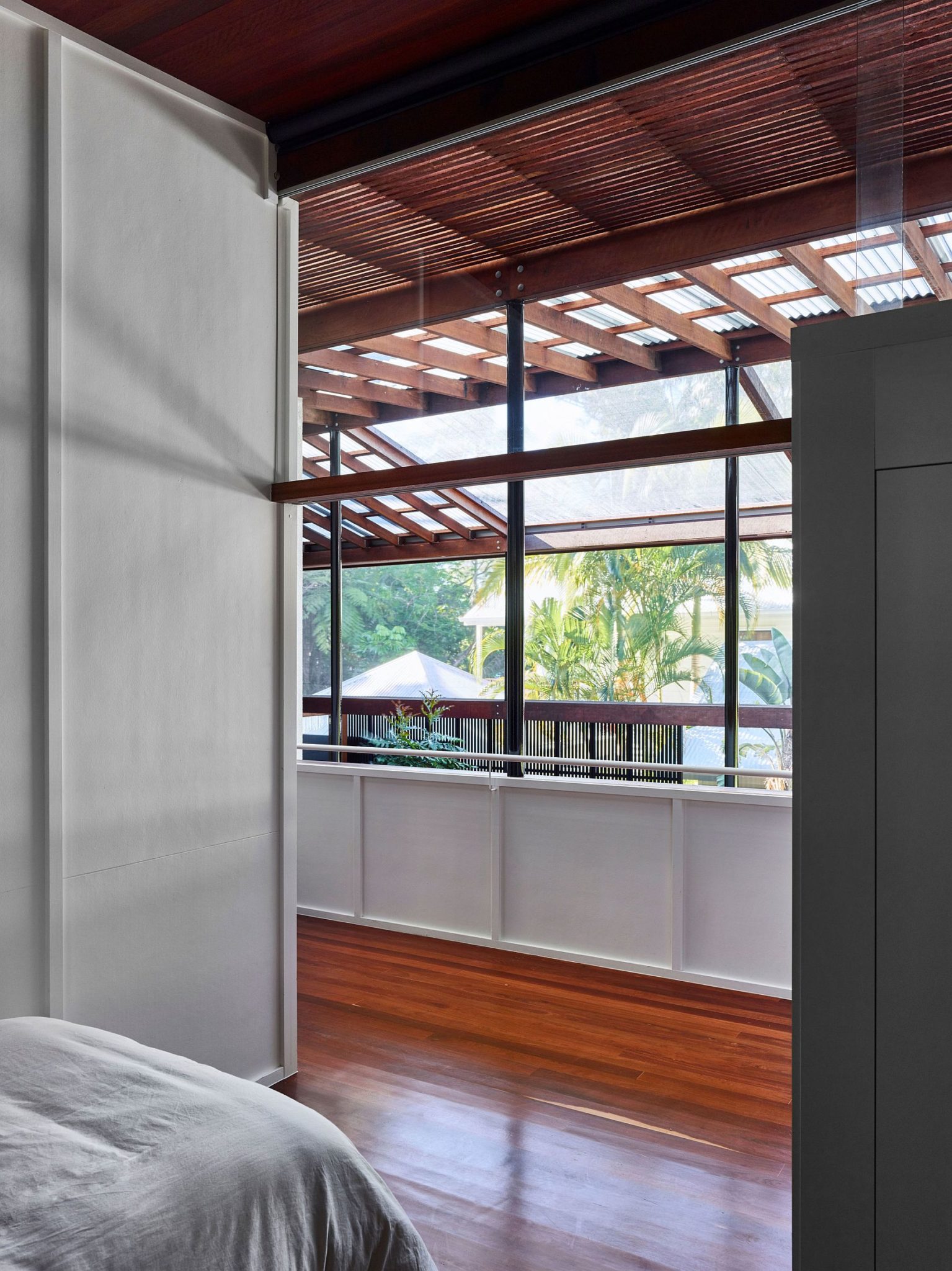 Wooden and concrete verandah style holiday home near a rainforest