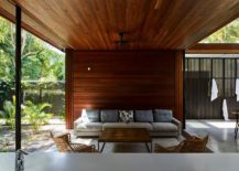 Wooden-patio-inside-th-verandah-style-home-set-in-a-Rainforest-217x155