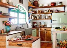 Wooden shelving combines modern and rustic elements with ease 217x155 Rugged Charm: 20 Rustic Shelving Ideas for your Modern Kitchen