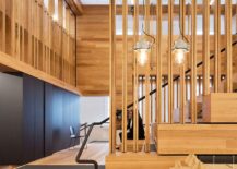 Wooden-slats-and-a-high-ceiling-give-the-office-a-modern-industrial-look-217x155