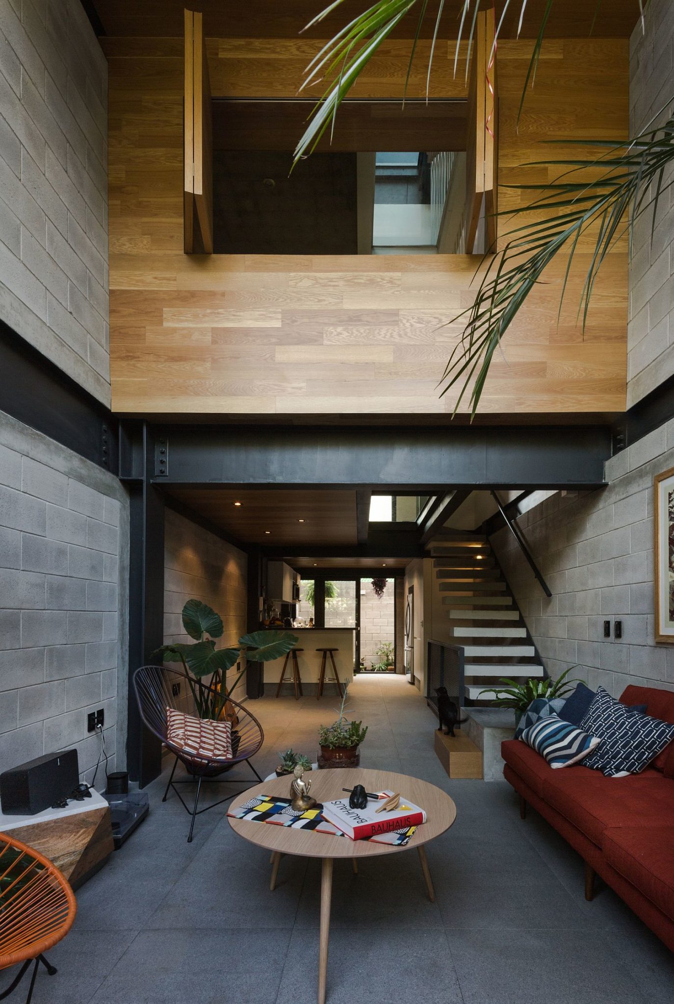 Wooden top level of the townhouse with private spaces