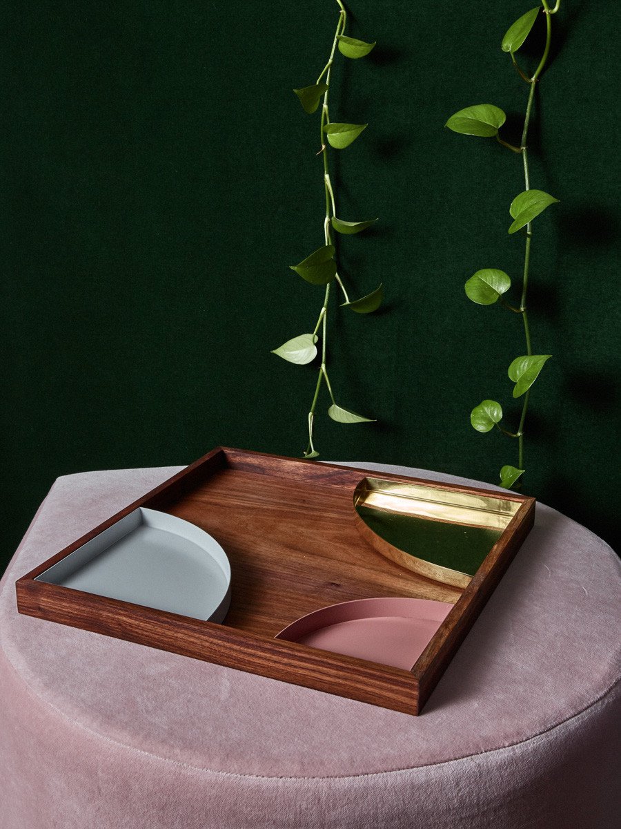 Wooden tray with metal inserts