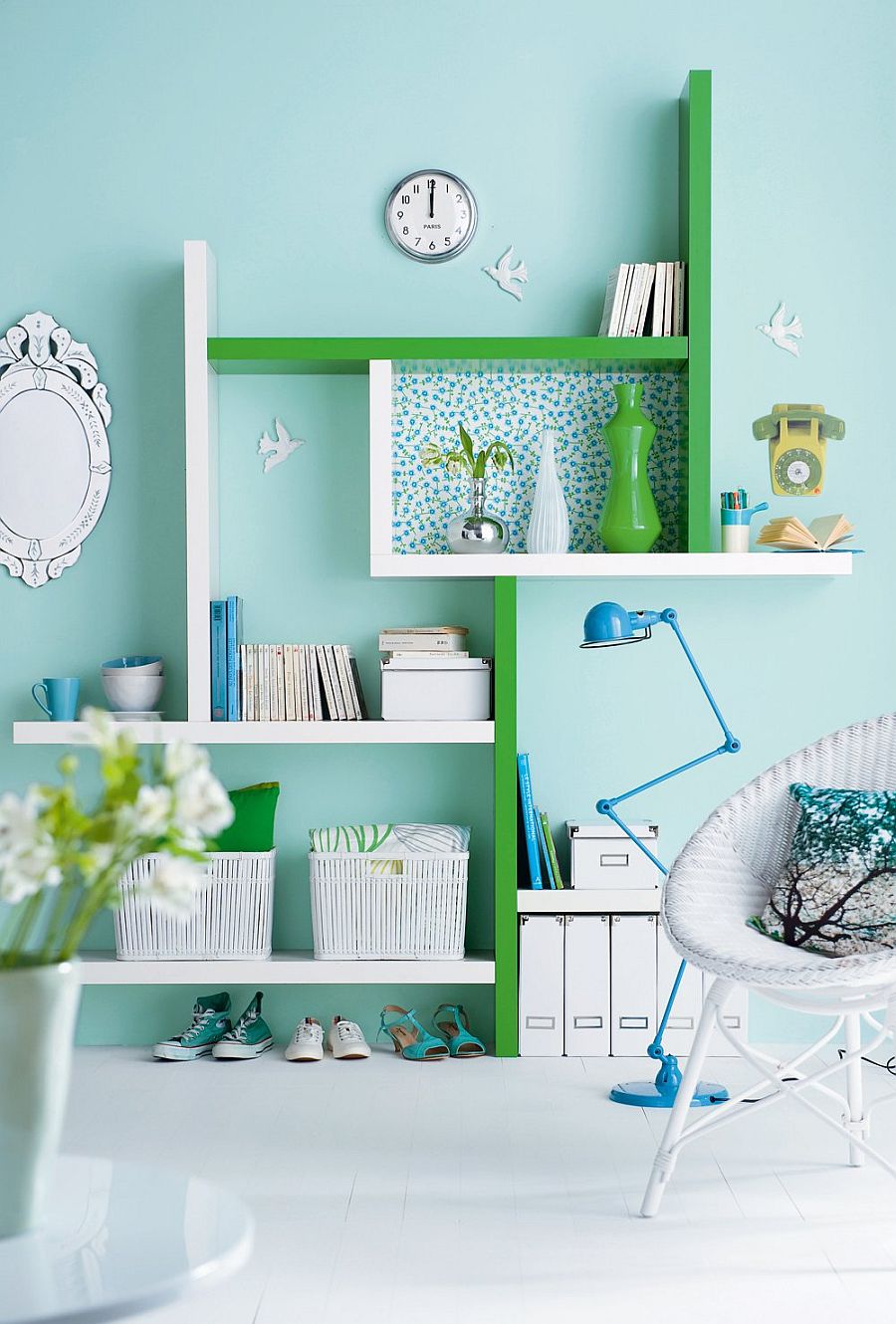 Colorful home office in pastel blue with pops of green