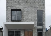 Concrete-exterior-of-the-home-with-wooden-door-217x155