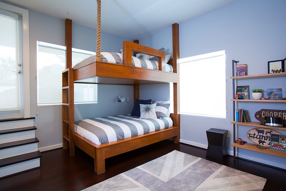 Contemporary kids' room with bunk beds and a rug with Union Jack motif...