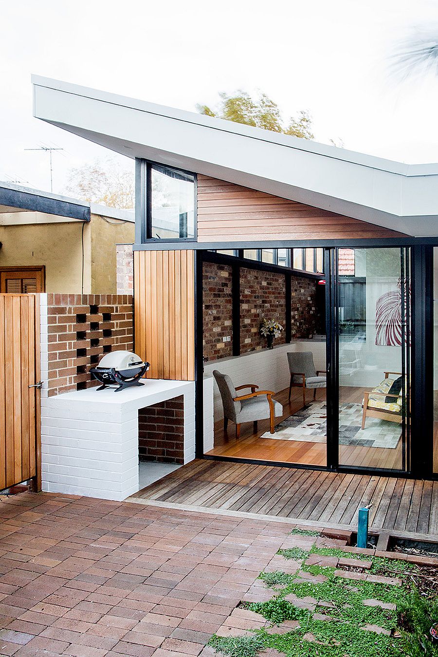 Courtyard barbecue area next to the new addition