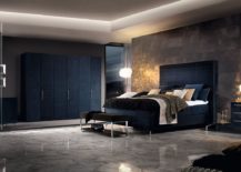 Dark-blue-and-concrete-combine-seamlessly-in-this-contemporary-bedroom-217x155