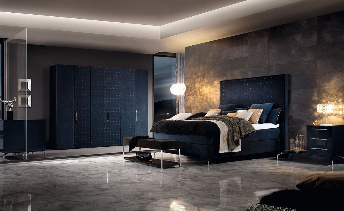 Dark blue and concrete combine seamlessly in this contemporary bedroom