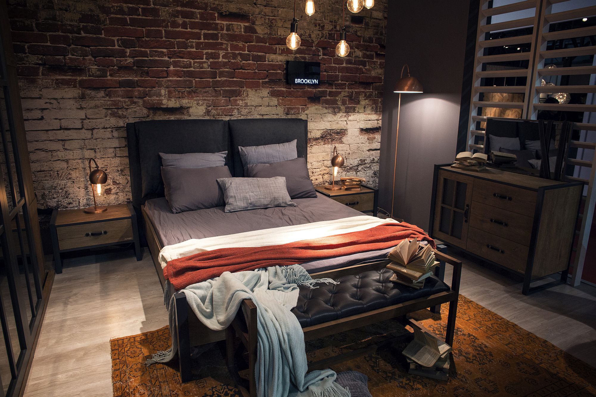 Floor lamps and bedside lighting with metallic finish bring industrial style to the bedroom