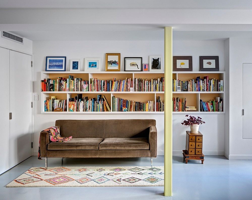 Funtional-wall-delineates-space-while-providing-ample-shelf-space-for-books