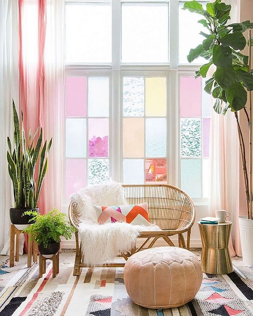 Gorgeous home office in lovely pastels with refreshing indoor plants