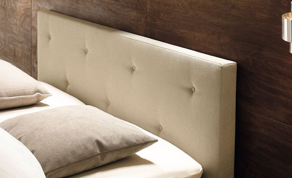 Gorgeous tufted headboard adds to the luxury of the lovely bed