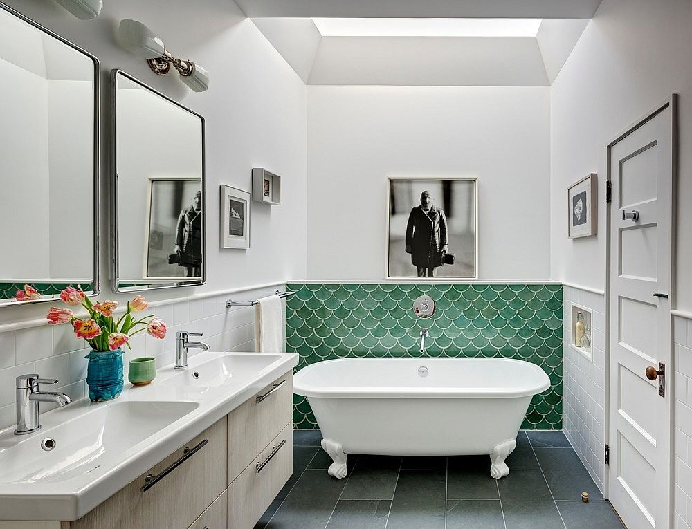 Green tiles bring color to modern bathroom in white