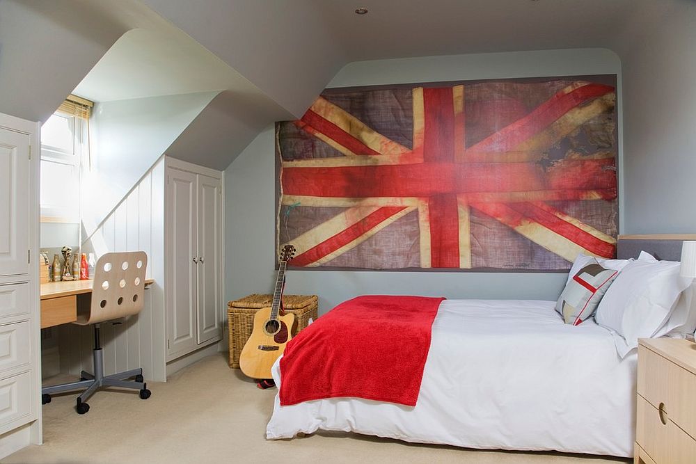 Large-canvas-featuring-the-faded-image-of-a-Union-Jack-brings-color-to-this-small-kids-room