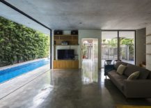 Living-area-and-kitchen-connected-with-the-pool-outside-217x155