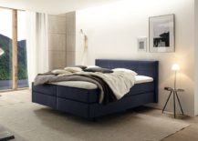 Modern-bedroom-in-white-with-the-Boxspring-bed-in-blue-217x155