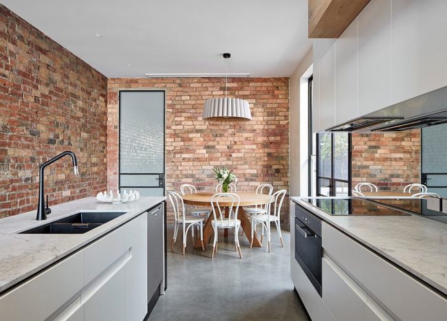 Kitchens With Concrete Floors A Sustainable And Durable Trend Decoist   Modern Kitchen With Brick Walls And Space Savvy Arrangement 650x467 