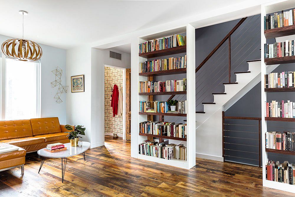 Modern revamp of wood-framed rowhouse in Brooklyn for a book and music loving couple