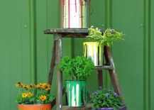 Old-paint-cans-turned-into-planters-bring-both-metallic-dazzle-and-colorful-zest-217x155