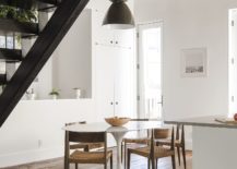 Oversized-pendant-light-above-the-small-dining-space-217x155