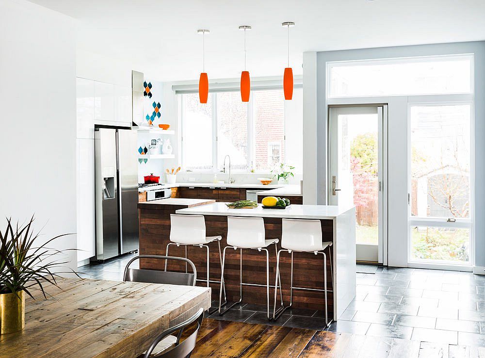 Reclaimed wood for the kitchen island matches with the aesthetics of the floor