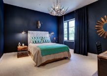 Refined-bedroom-in-dark-blue-with-lovely-matching-drapes-217x155