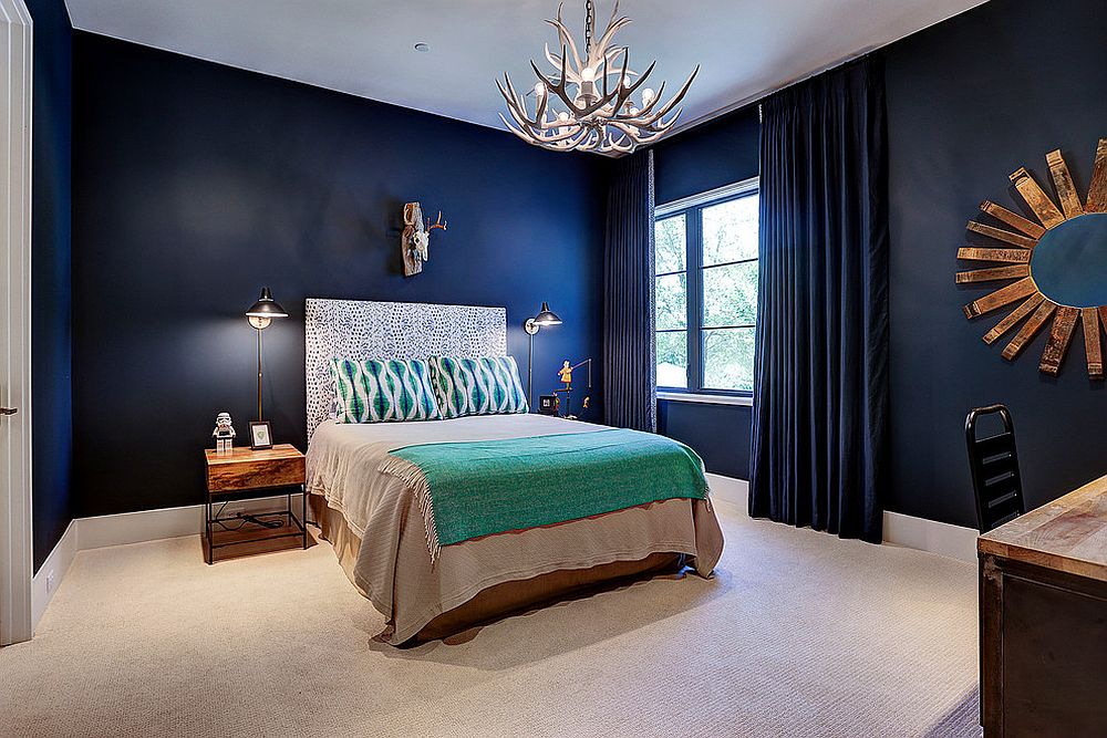 Refined bedroom in dark blue with lovely matching drapes