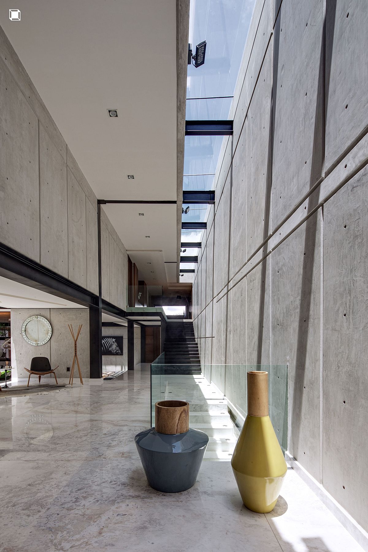 Series of skylights bring natural light into the large, sweeping living area