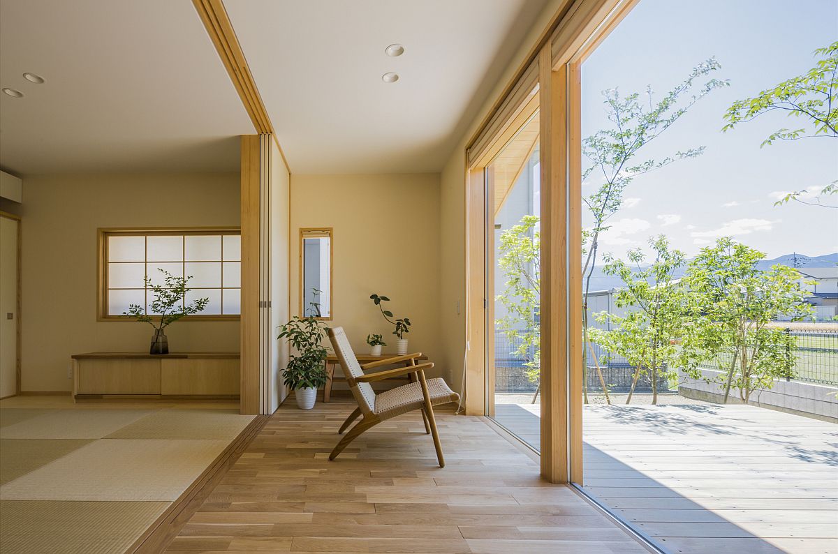 Shaded deck of the home with a view of the distant mountains