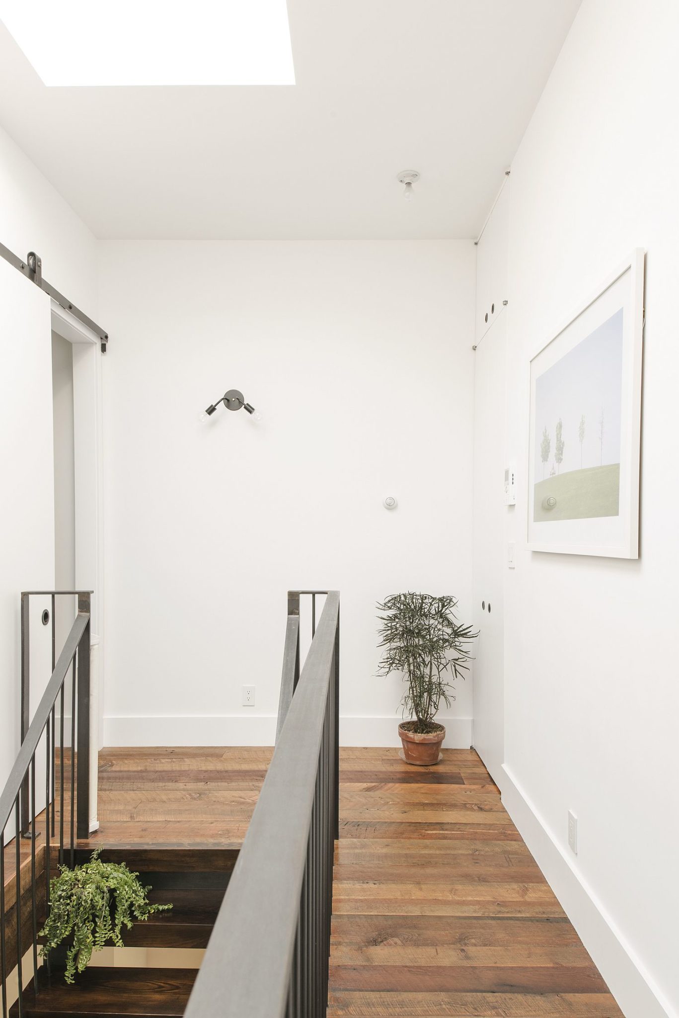 Skylight brings ample natural light into the renovated townhouse