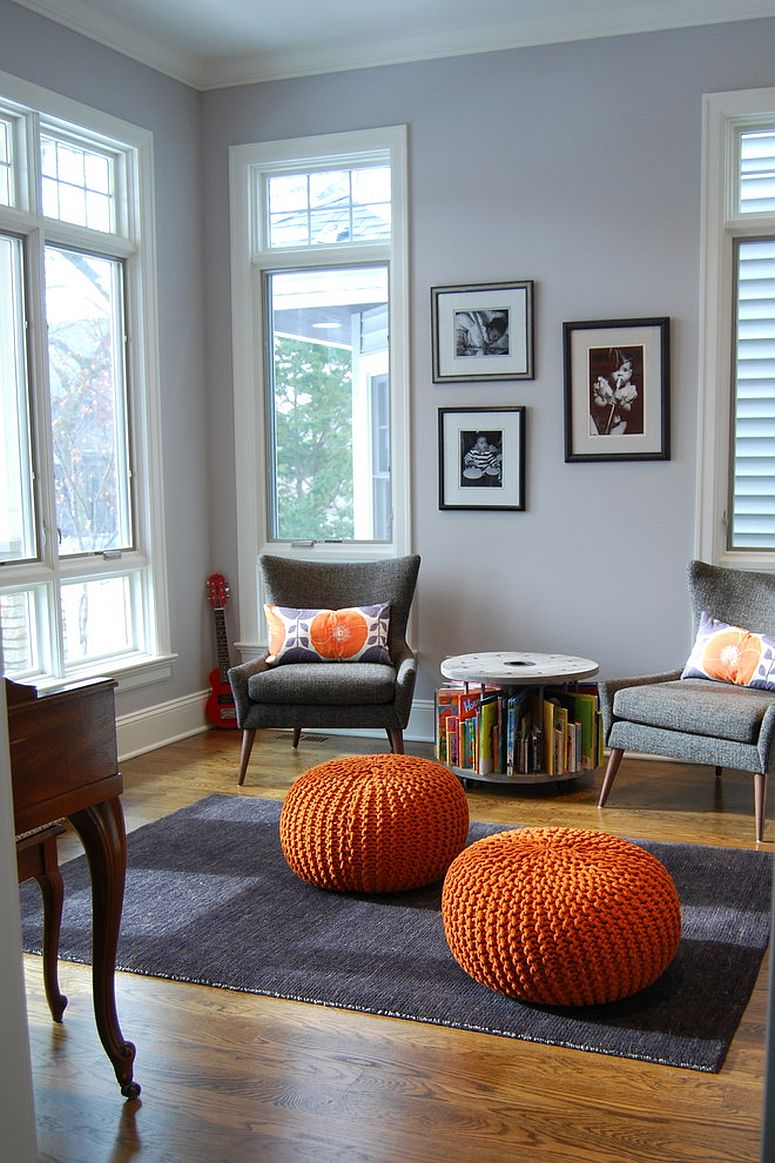 Small round table with book storage space is a great space-saver