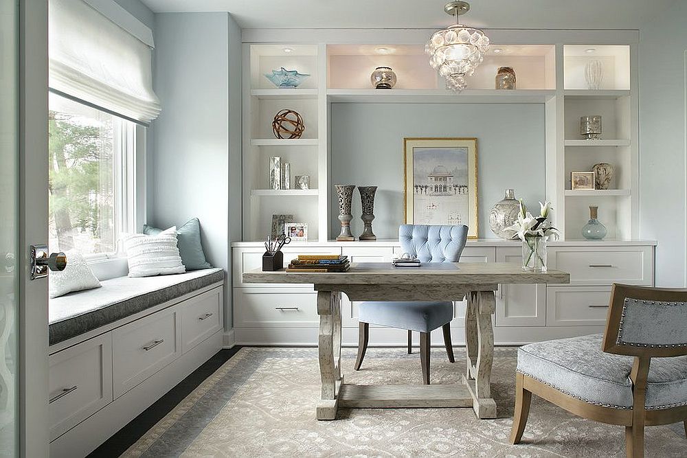 Space-savvy home office with window seat in pastel blue