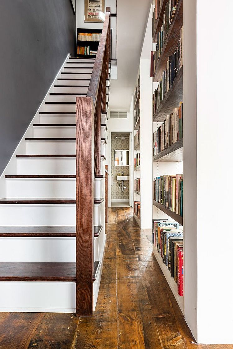 Staircase behind the new bookshelves seems cleverly hidden from view